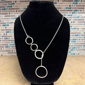 Chico’s asymmetrical silver tone bolo style necklace